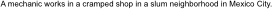 A mechanic works in a